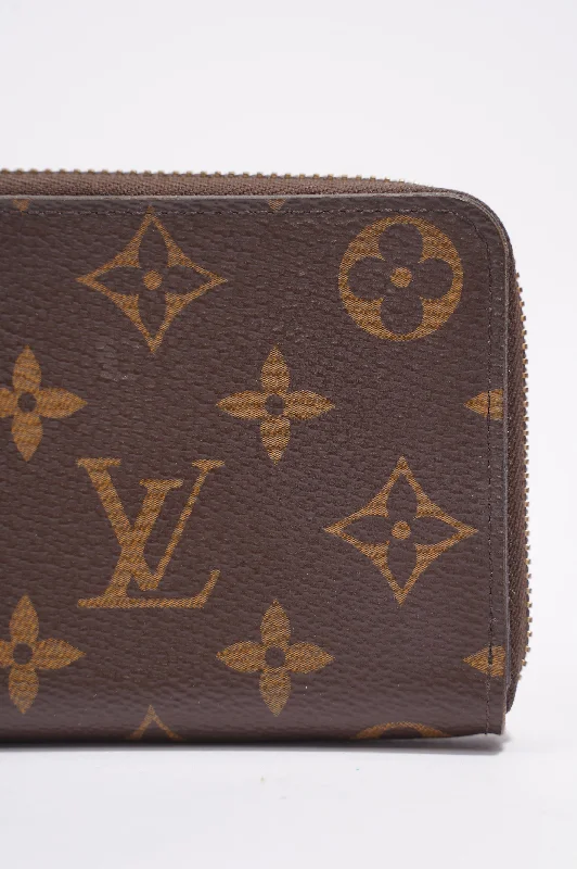 Louis Vuitton Clemence Wallet Monogram Coated Canvas